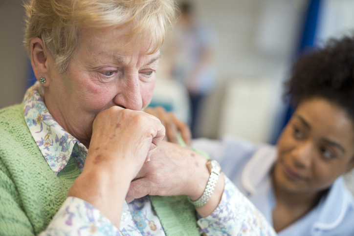 concerned woman at a nursing home - Chicago Nursing Home Abuse Lawyer