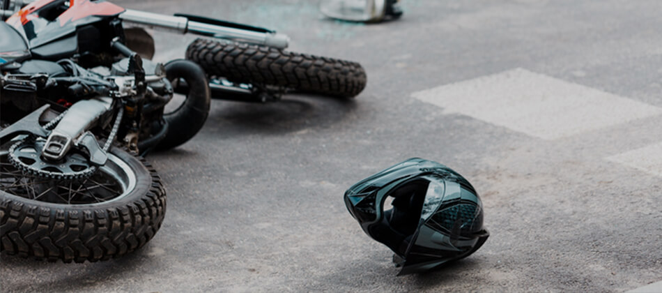 Motorcycle helmet on ground after motorcycle accident
