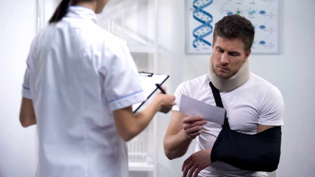 Chicago catastrophic injury lawyer - Chicago Doctor holding a piece of paper reading it to a person that suffered a catastrophic injury. 