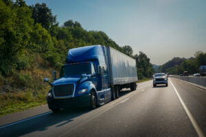 Semi truck sharing road with a car - How to choose a Joliet lawyer for truck accident injuries